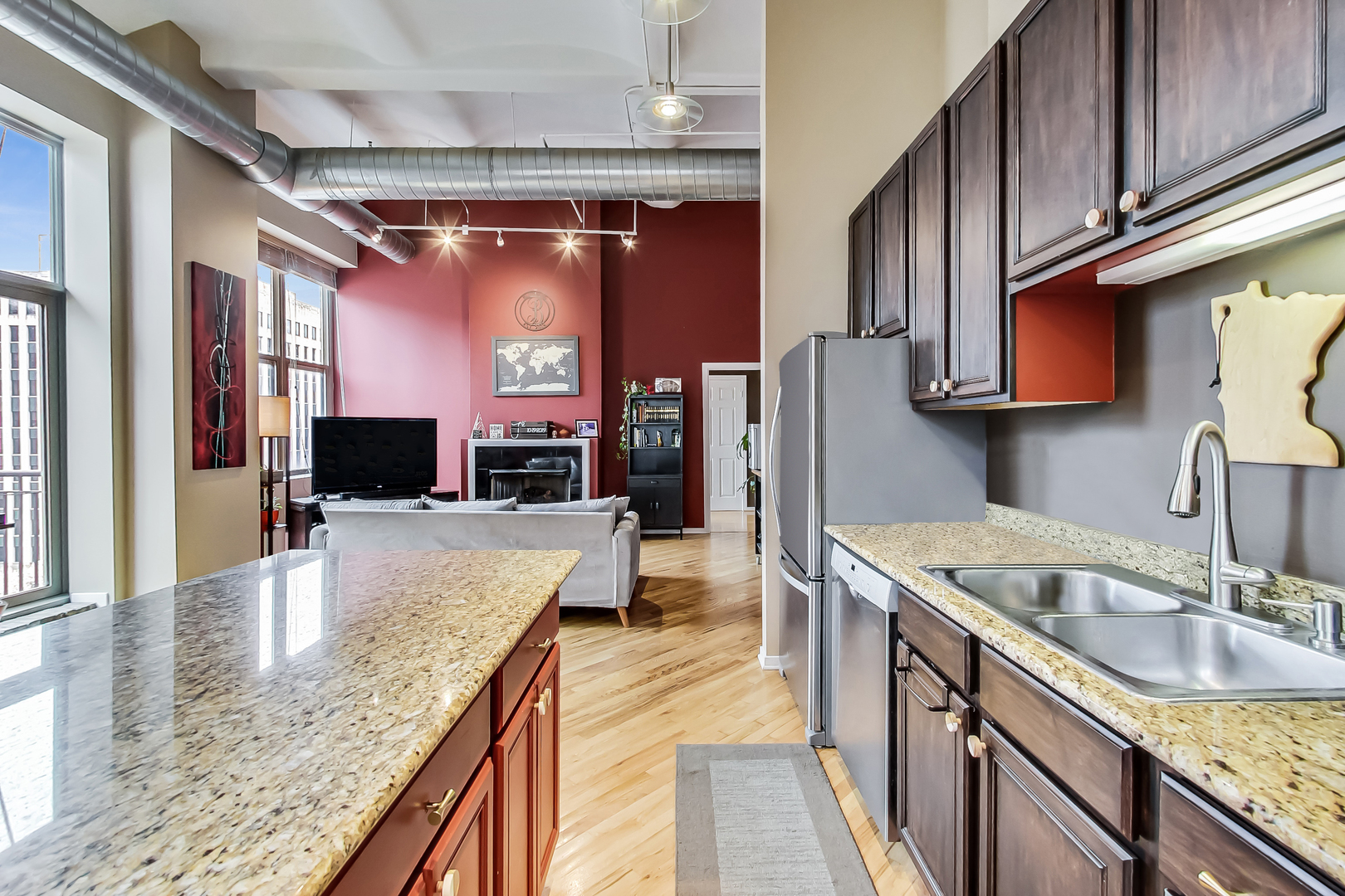 500 South Clinton Street, Unit 810 Chicago, IL 60607 - Photo 26 of 54 a kitchen with stainless steel appliances granite countertop a sink stove and refrigerator