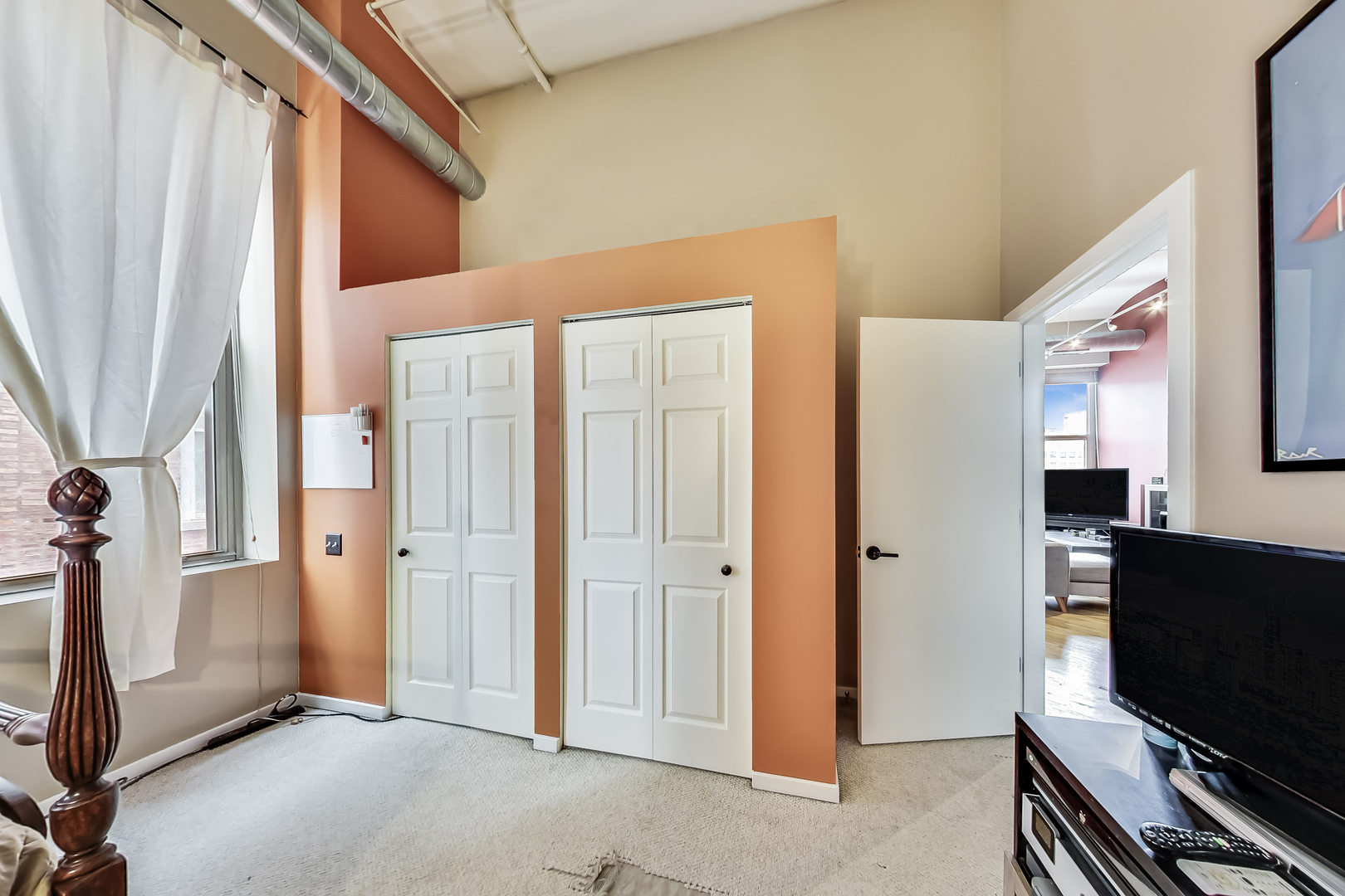 500 South Clinton Street, Unit 810 Chicago, IL 60607 - Photo 28 of 54 a view of a livingroom with wooden floor and stairs