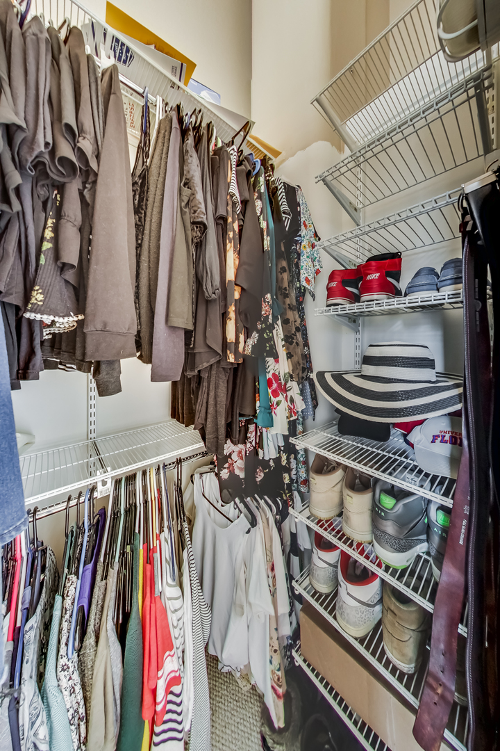 500 South Clinton Street, Unit 810 Chicago, IL 60607 - Photo 35 of 54 a view of walk in closet with clothes
