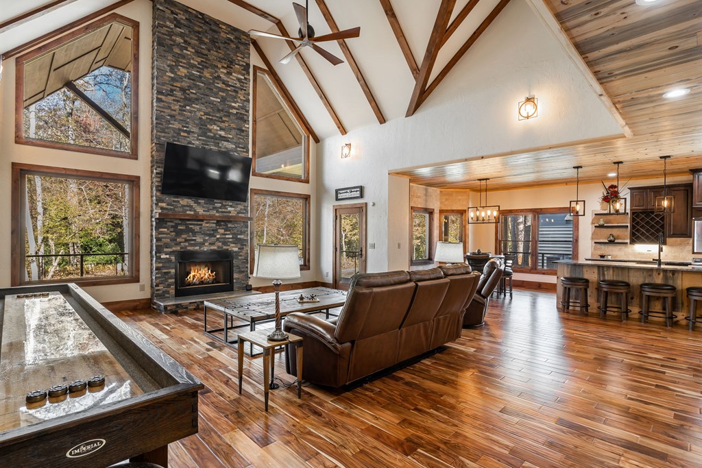 1248 Sunset Road Epworth, GA 30541 - Photo 17 of 65 a living room with furniture and a fireplace