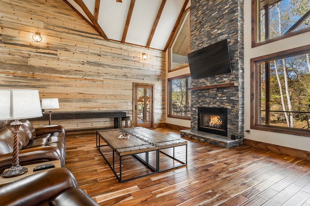 1248 Sunset Road Epworth, GA 30541 - Photo 18 of 65 a living room with furniture and a fireplace