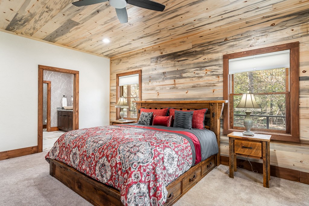 1248 Sunset Road Epworth, GA 30541 - Photo 21 of 65 a bedroom with a large bed and a window