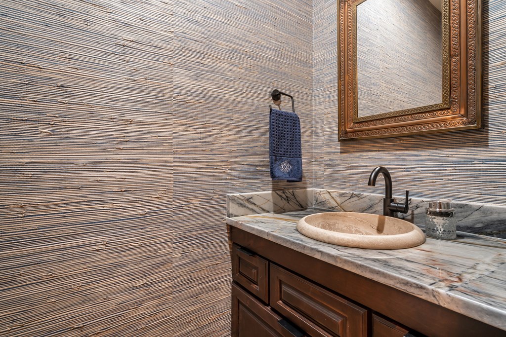1248 Sunset Road Epworth, GA 30541 - Photo 27 of 65 a bathroom with a sink and a mirror