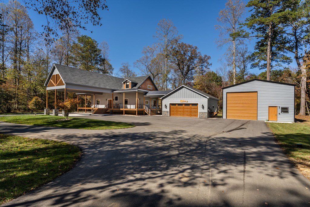 1248 Sunset Road Epworth, GA 30541 - Photo 3 of 65 a front view of a house with a yard