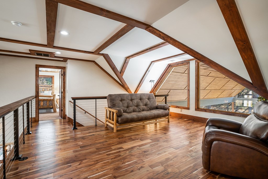 1248 Sunset Road Epworth, GA 30541 - Photo 33 of 65 a living room with furniture and a large window
