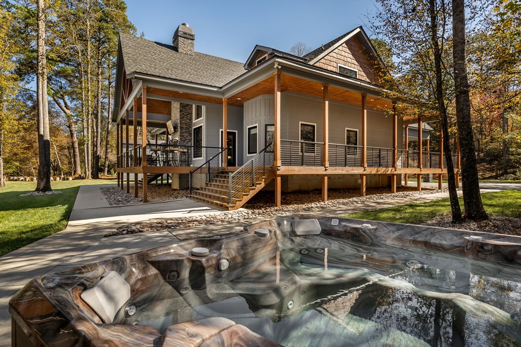 1248 Sunset Road Epworth, GA 30541 - Photo 44 of 65 a front view of a house with garden