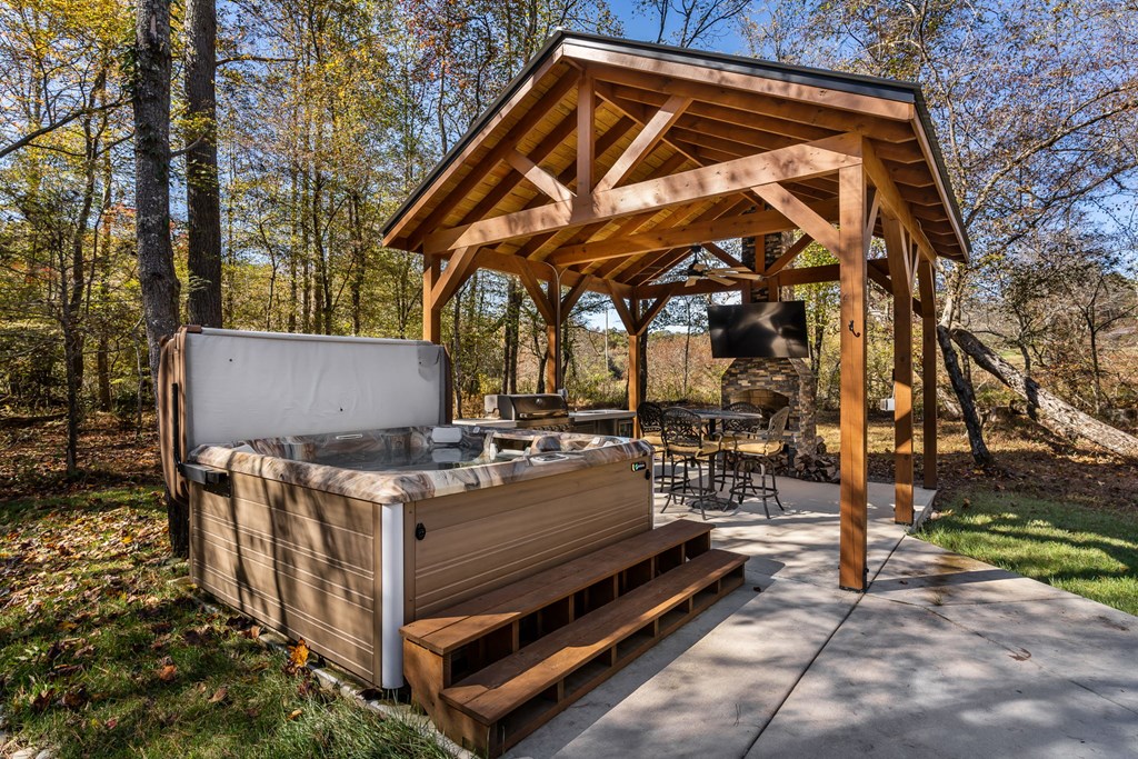 1248 Sunset Road Epworth, GA 30541 - Photo 46 of 65 a view of a roof deck with a small yard