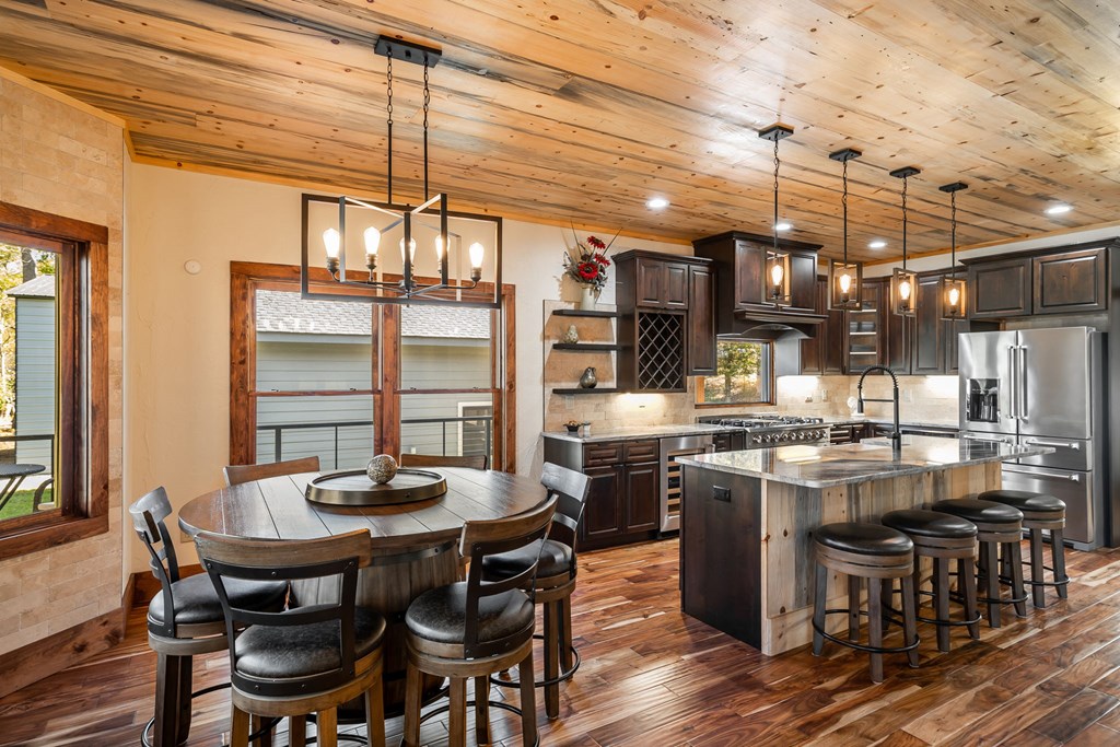 1248 Sunset Road Epworth, GA 30541 - Photo 8 of 65 a view of a dining room with furniture window and wooden floor