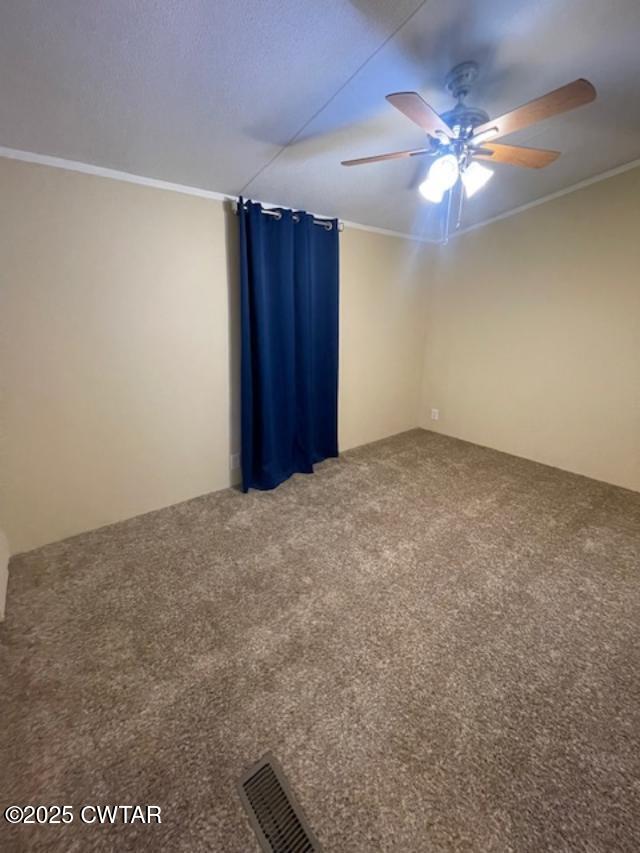 4555 Rue Hamner Road Cedar Grove, TN 38321 - Photo 36 of 45 a view of an empty room with a chandelier fan