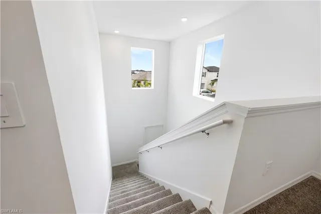 a view of hallway with stairs