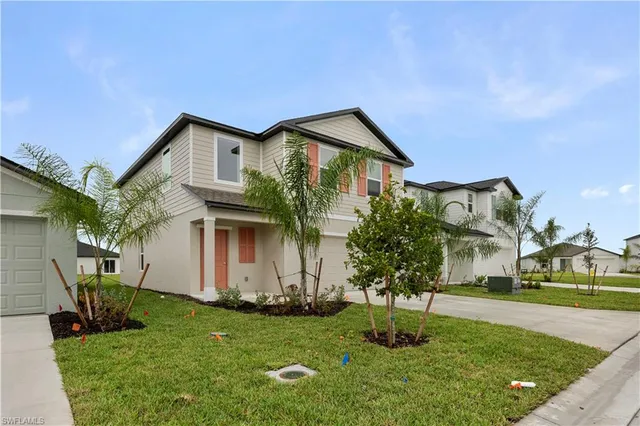 a front view of house with yard