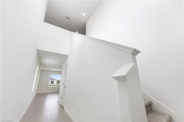 a view of a hallway with closet