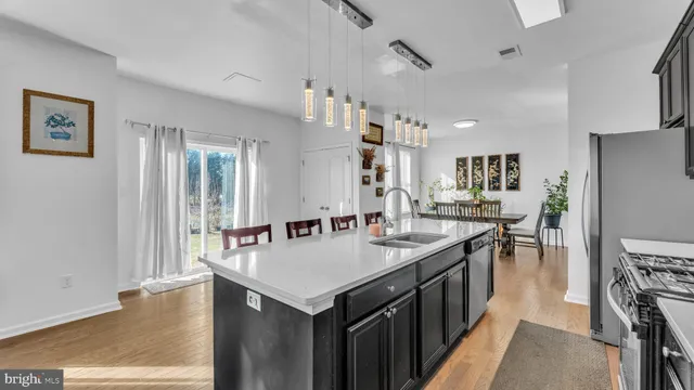 a kitchen with counter space and center island