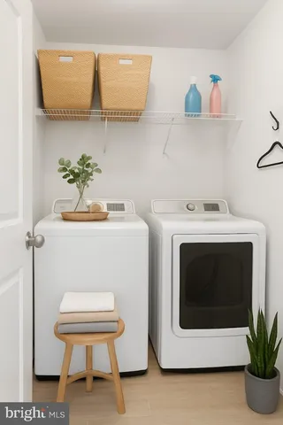 a utility room with dryer and washer