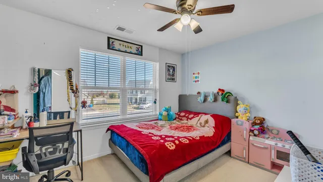 a view of a white house with a yard