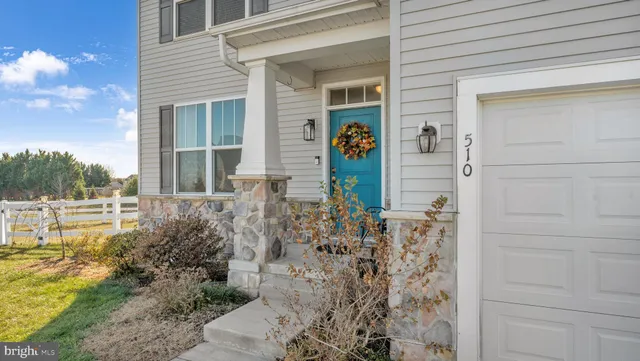 a view of a swimming pool with a yard