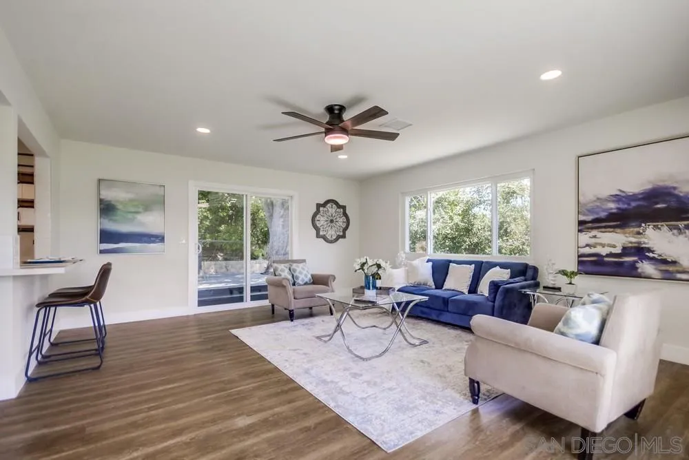 9841 Settle Road Santee, CA 92071 - Photo 14 of 46 a living room with furniture and a large window