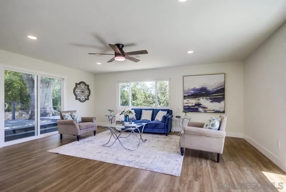 9841 Settle Road Santee, CA 92071 - Photo 15 of 46 a living room with furniture and a large window