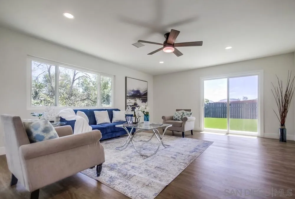 9841 Settle Road Santee, CA 92071 - Photo 16 of 46 a living room with furniture and a large window