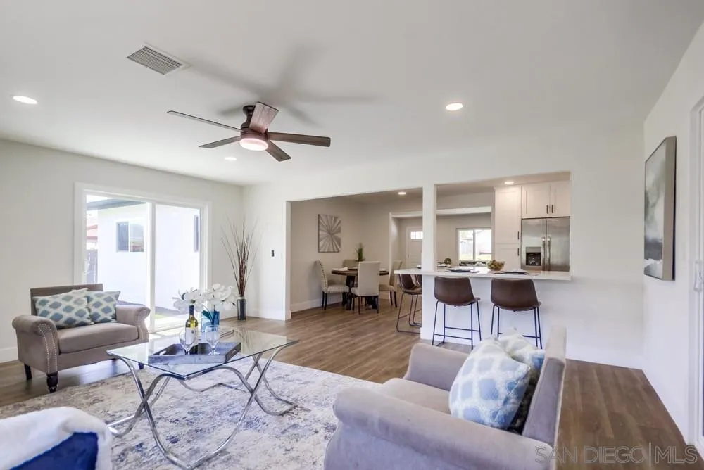 9841 Settle Road Santee, CA 92071 - Photo 17 of 46 a living room with furniture and a large window