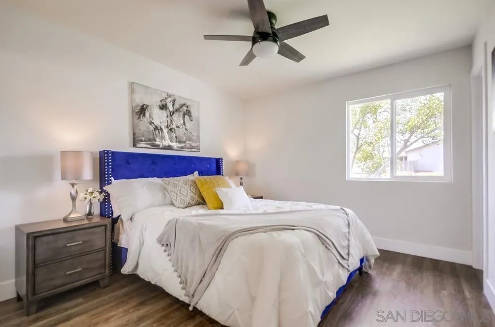 9841 Settle Road Santee, CA 92071 - Photo 27 of 46 a bedroom with a bed and a window