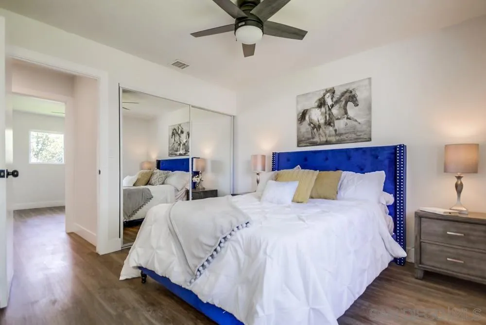 9841 Settle Road Santee, CA 92071 - Photo 28 of 46 a bedroom with bed and window