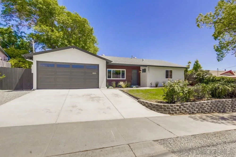 9841 Settle Road Santee, CA 92071 - Photo 3 of 46 a front view of a house with a yard