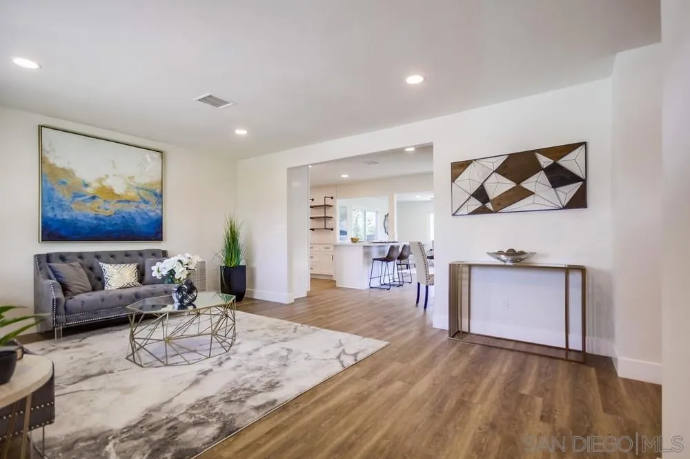 9841 Settle Road Santee, CA 92071 - Photo 6 of 46 a living room with furniture and a fireplace