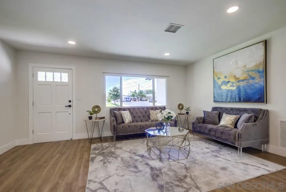 9841 Settle Road Santee, CA 92071 - Photo 7 of 46 a living room with furniture and a large window
