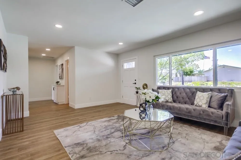 9841 Settle Road Santee, CA 92071 - Photo 8 of 46 a living room with furniture and a large window