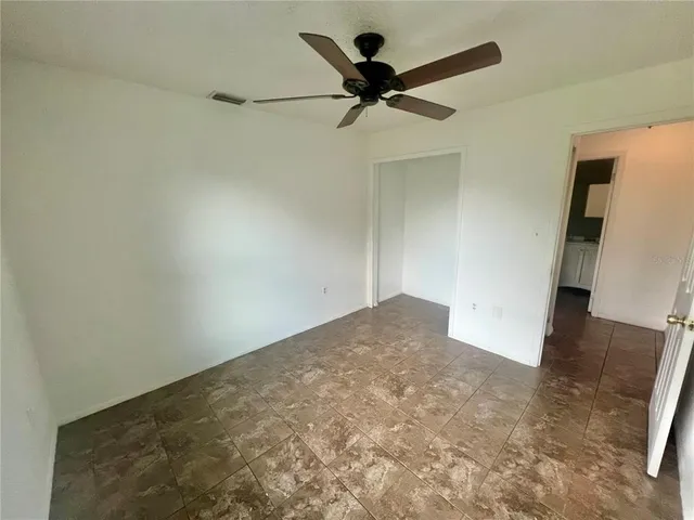 a view of a big room with wooden floor