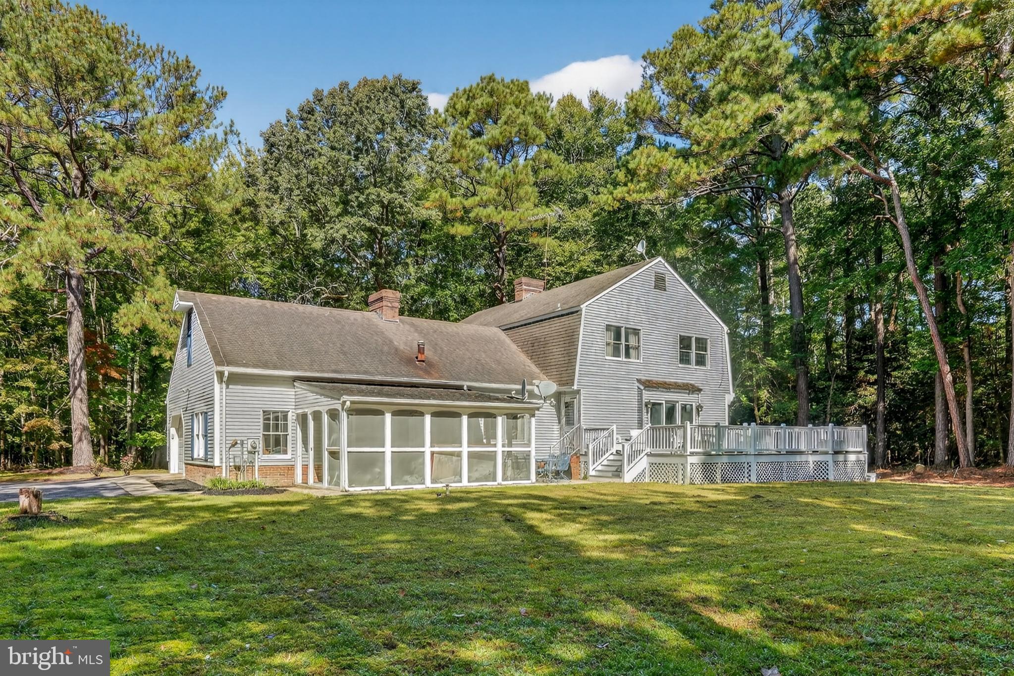 11155 Assateague Road Berlin, MD 21811 - Photo 2 of 36 Charming home nestled among lush pines.