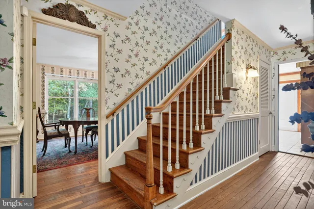 a view of entryway with wooden floor