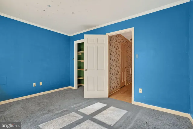 an empty room with closet