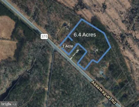 a blue sign that is on the side of a building