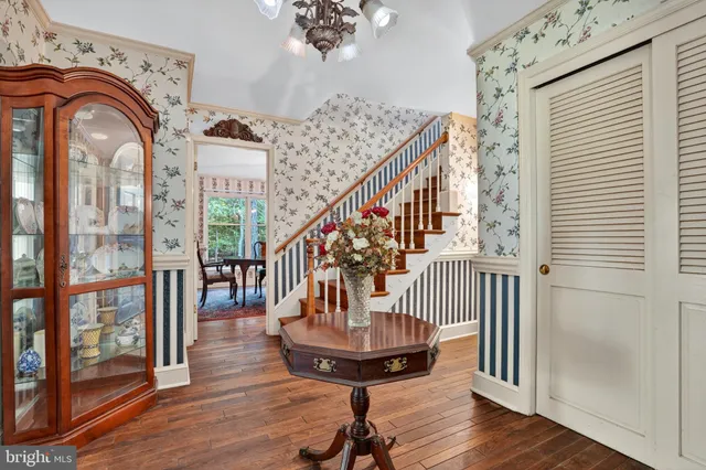 a view of entryway with wooden floor