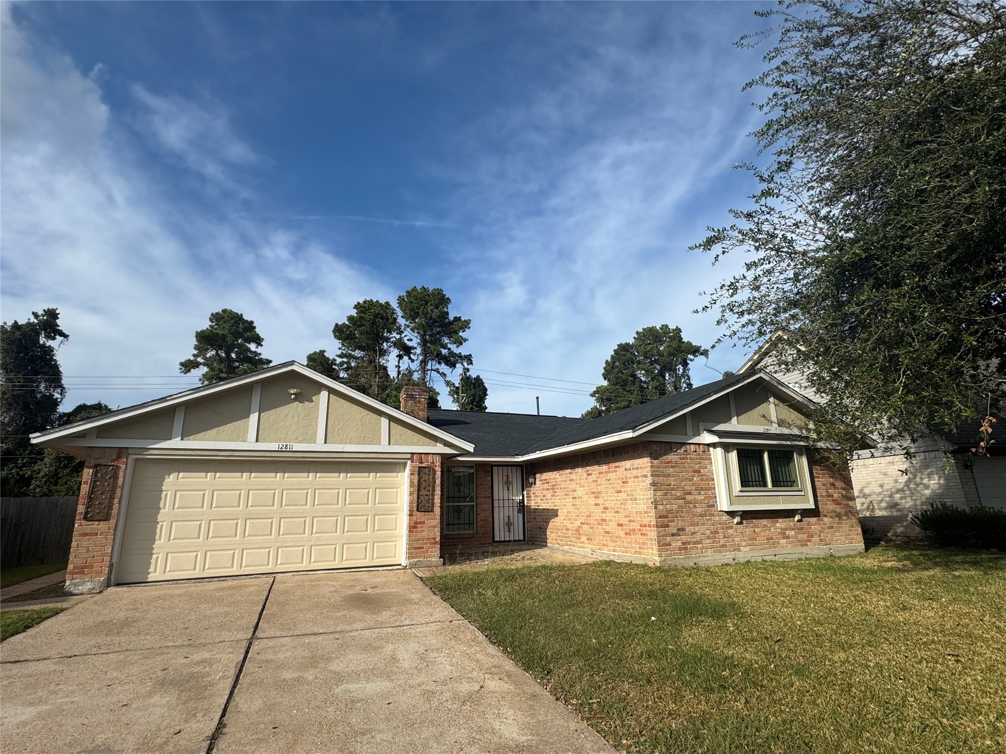 12811 Labelle Lane Houston, TX 77015 - Photo 1 of 14 a view of a house with a yard