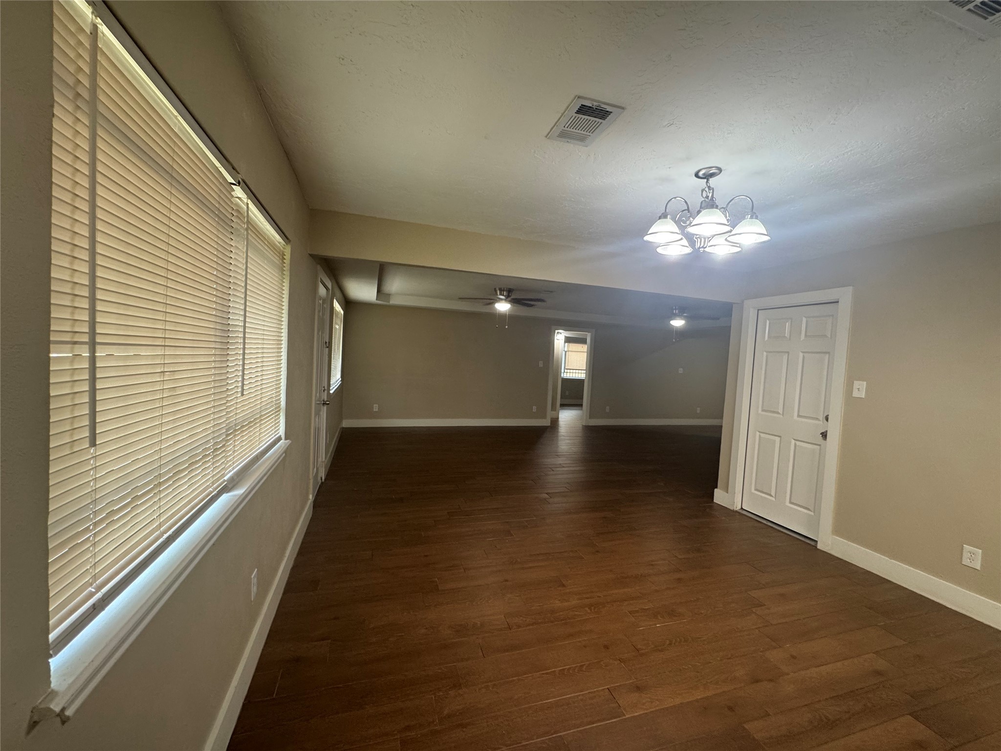 12811 Labelle Lane Houston, TX 77015 - Photo 6 of 14 a view of a room with a chandelier