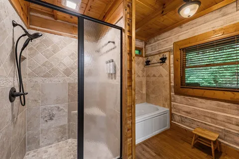 a bathroom with a double vanity sink and mirror