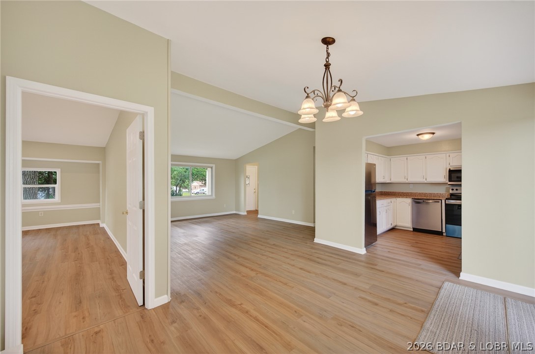 177 Storage Road Eldon, MO 65026 - Photo 10 of 34 Flows effortlessly from spacious living room into