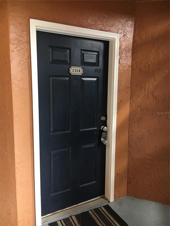 5152 Conroy Road, Unit 1314 Orlando, FL 32811 - Photo 3 of 9 a view of a closet area
