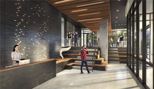 a living room with furniture a floor to ceiling window and potted plant