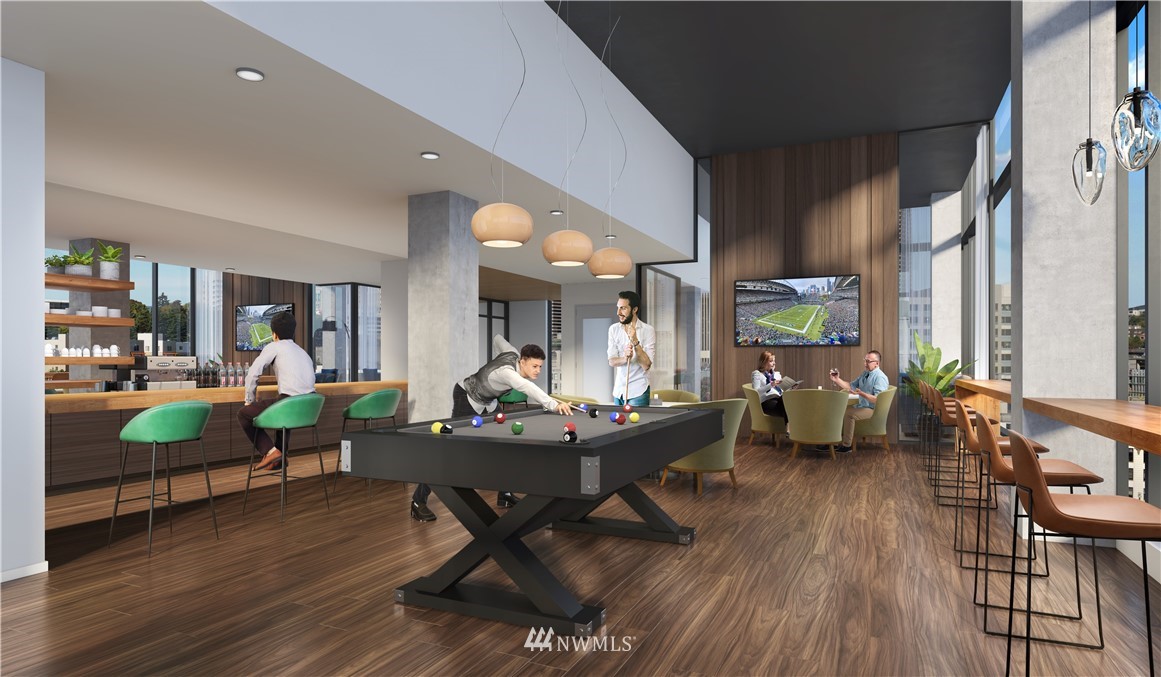 450 South Main Street, Unit 1702 Seattle, WA 98104 - Photo 7 of 20 a living room filled with furniture and a wooden floor