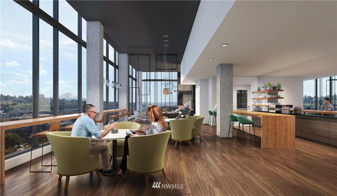 450 South Main Street, Unit 1702 Seattle, WA 98104 - Photo 9 of 20 a living room with fireplace furniture and a large window