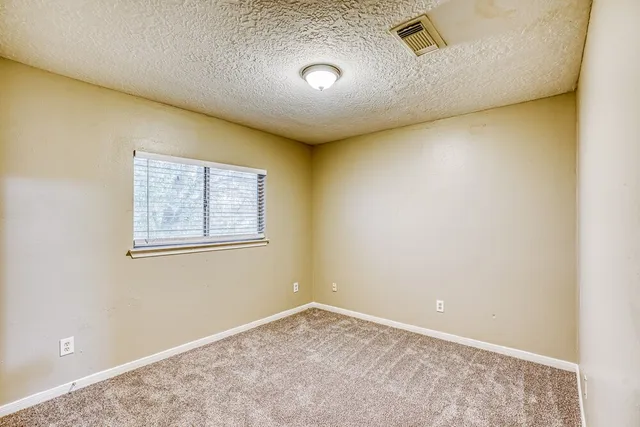 an empty room with a workbench