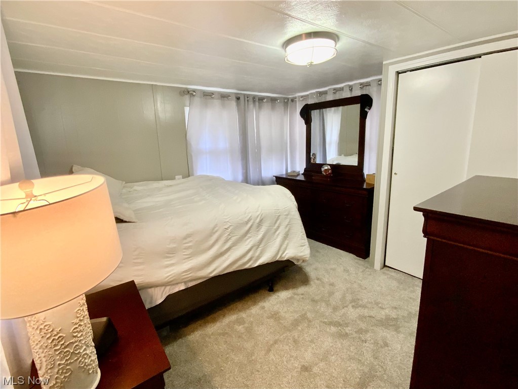 4199 Massillon Road, Unit 223 Uniontown, OH 44685 - Photo 11 of 20 Carpeted bedroom with a closet