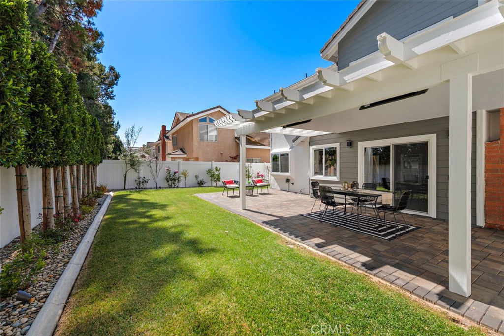 11 Bayside Irvine, CA 92614 - Photo 21 of 37 a swimming pool with outdoor seating and yard