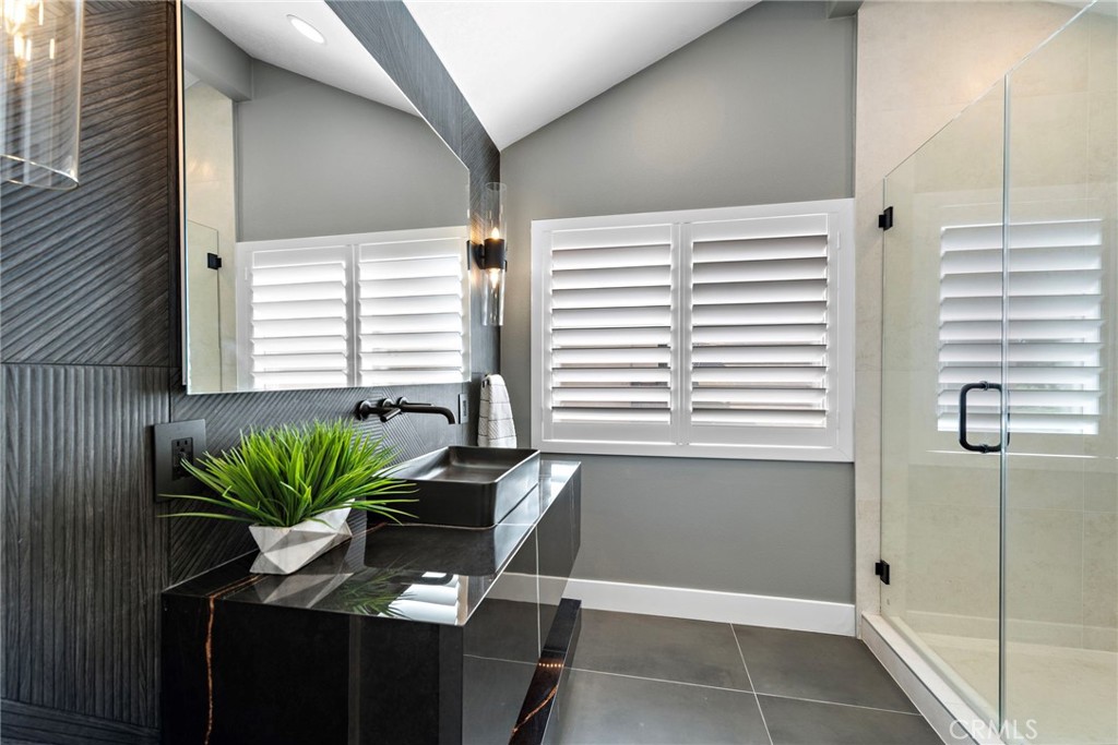 11 Bayside Irvine, CA 92614 - Photo 29 of 37 a view of a bathroom with a shower