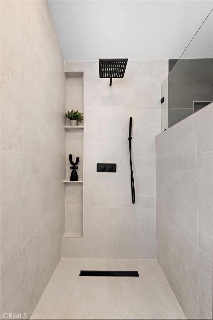 11 Bayside Irvine, CA 92614 - Photo 30 of 37 a bathroom with a shower