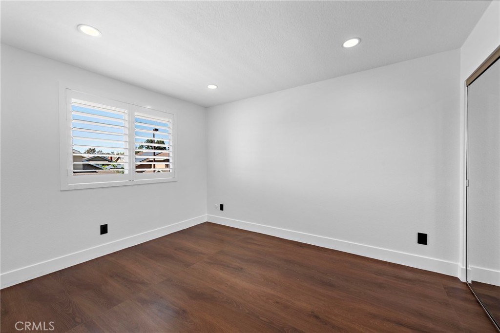 11 Bayside Irvine, CA 92614 - Photo 32 of 37 wooden floor in an empty room